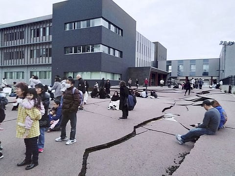 Road cracks caused by an earthquake is seen in Wajima, Ishikawa prefecture, Japan January 1, 2024, in this photo released by Kyodo. 