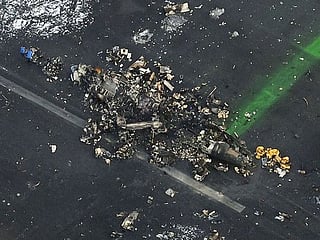 Japan crash probe: Coast guard plane not cleared for take-off
