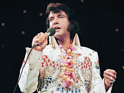 File photo: Elvis Presley performs at the "Aloha from Hawaii' concert special in January 1973, in Honolulu, Hawaii. 