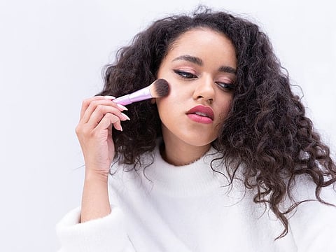 Most pink blushes aren't pigmented enough to colour rich skin tones, which is why purple shades are flying off the shelves.