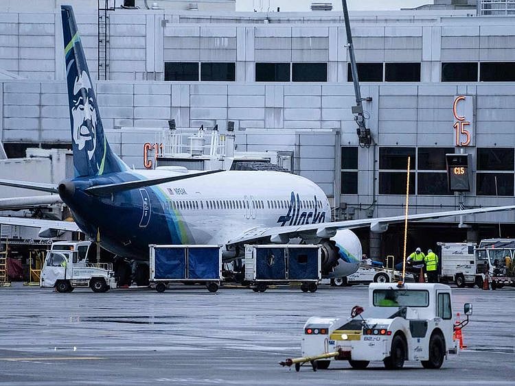 An Alaska Airlines Boeing 737 MAX 9 plane sits at a gate at Seattle-Tacoma International Airport on January 6, 2024 in Seattle, Washington.