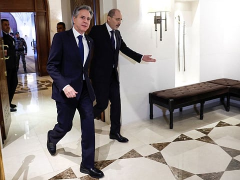 Blinken with Jordanian Foreign Minister Ayman Safadi, during Blinken's week-long trip aimed at calming tensions across the Middle East, in Amman on January 7, 2024.  