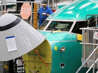 Boeing warns customers of further delays on 737 Max amid crisis