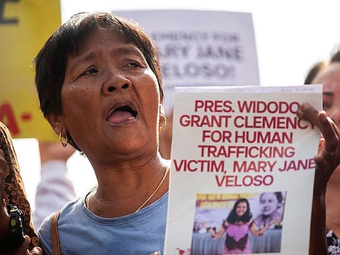 Celia Veloso, mother of Mary Jane Veloso, joins a protest calling for the clemency of her daughter who is on death row after being convicted in Indonesia for drug smuggling, in time with Indonesia President Joko Widodo's visit to Manila, Philippines.