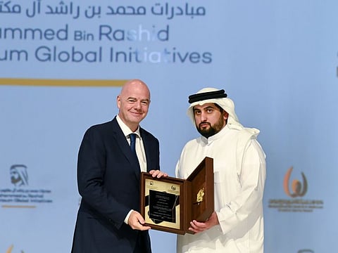 Sheikh Ahmed bin Mohammed bin Rashid Al Maktoum presents Fifa President Gianni Infantino with the International Sports Personality Award.