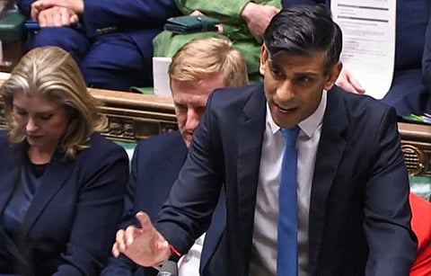 A video grab from footage broadcast by the UK Parliament's Parliamentary Recording Unit (PRU) shows Britain's Prime Minister Rishi Sunak speaking during the first Prime Ministers Questions (PMQs) session of the year at the House of Commons, in London, on January 10, 2024.  