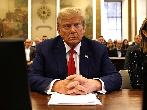Former US President Donald Trump sits in New York State Supreme Court during the civil fraud trial against the Trump Organization, in New York City on January 11, 2024. Trump's legal team will deliver closing arguments January 11 in the fraud case after the judge barred the former president from using the trial finale as an election campaign grandstand.