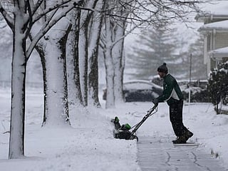 Pictures: Snowstorms hit US Midwest and Northwest