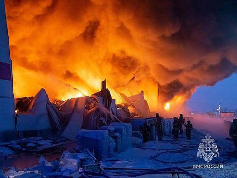 This handout image released by the Russian Emergencies Ministry on January 13, 2024 shows the site of a major fire that broke out in a warehouse of Russia's e-commerce giant Wildberries in Shushary outside Saint Petersburg. 