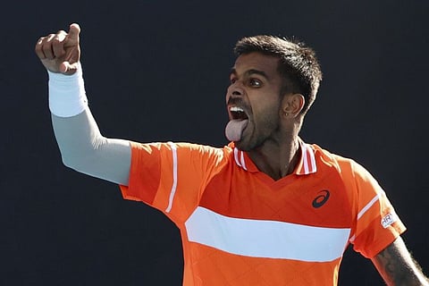 Sumit Nagal of India celebrates after defeating Alexander Bublik of Kazakhstan in the first round of the Australian Open.