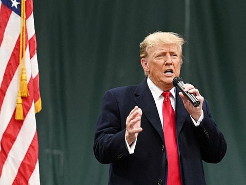 Republican presidential candidate and former US President Donald Trump speaks as he visits a caucus site at Horizon Event Center in Clive, Iowa, on January 15, 2024. 
