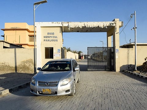 A car leaves the district headquarters hospital (DHQ) in Panjgur town of Balochistan province on January 17, 2024 where victims of an Iranian air strike were moved earlier this morning.  