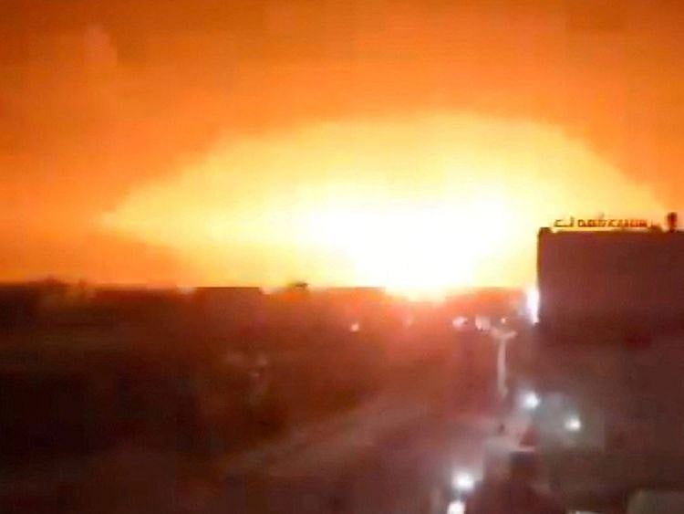  An explosion occurs following an attack, amid the US-led strikes on Houthi targets, in Dhamar, Yemen, in this screengrab from a video released on January 18, 2024.  