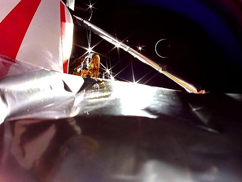 This handout image released by Astrobotic on January 18, 2024 shows an image from Astrobotic's Peregrine Lunar Lander in space showing Earth in its sights. 