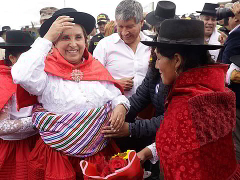President Dina Boluarte during the laying of the foundation stone for the asphalting of a road in the Chiara district in the Ayacucho region, some 570 km southeast of Lima, on January 20, 2024. Peruvian Boluarte was assaulted and shaken by two women on Saturday during an official event in the Andean city of Ayacucho, where 10 people were killed in protests against her government.  