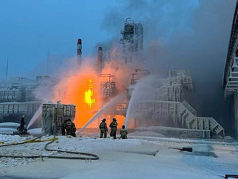 In this photo released by Telegram Channel of Leningrad Region Governor Alexander Drozdenko fire fighters extinguish the blaze at Russia's second-largest natural gas producer, Novatek in Ust-Luga, 165 kilometers southwest of St. Petersburg, Russia, on January 21, 2024.  