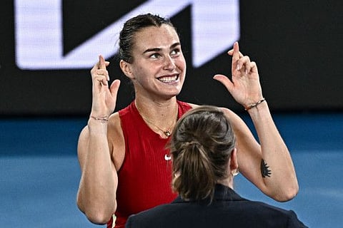 Belarus' Aryna Sabalenka jokes with the commentator after her victory against USA's Coco Gauff during their women's singles semi-final match during the Australian Open in Melbourne on Thursday.