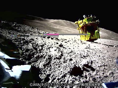 An image taken by a Lunar Excursion Vehicle 2 (LEV-2) of a robotic moon rover called Smart Lander for Investigating Moon, or SLIM, on the moon.