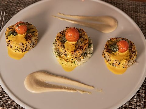 Vegan galette with quinoa, breadfruit, and creamy saffron sauce