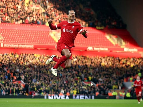 Liverpool's Virgil van Dijk celebrates scoring their fourth goal during a FA Cup fourth round against Norwich City at Anfield on Sunday.