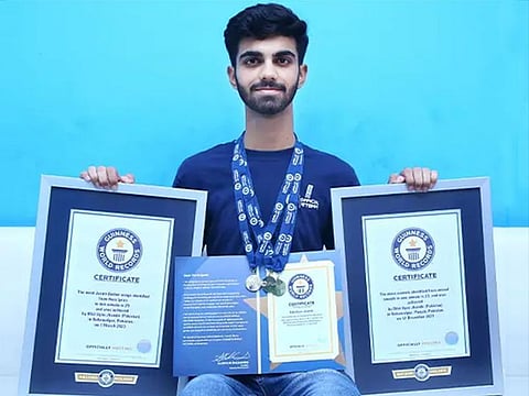 Bilal Ilyas Jhandir with his three Guinness World Record titles.