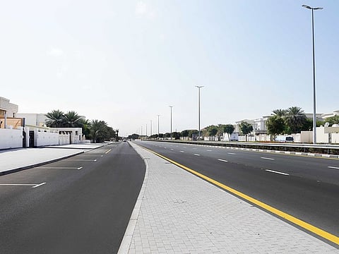 Service lane and parking spaces have been added to the road