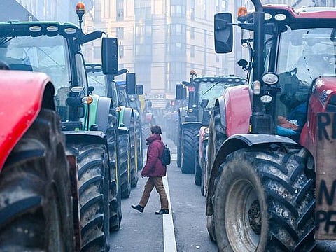 Photos: Angry farmers descend on Brussels to take protest to EU summit 