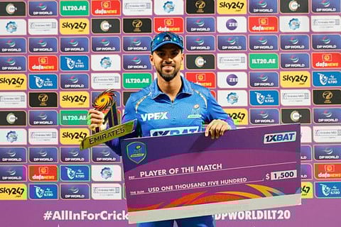Nicholas Pooran with the Player of the Match award in Abu Dhabi on Sunday.