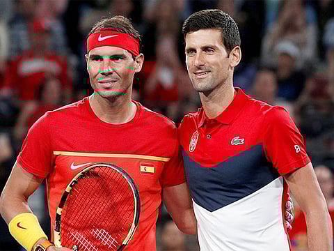 Spain’s Rafael Nadal and Serbia’s Novak Djokovic pose ahead of a match. 