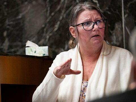 Jennifer Crumbley, the mother of a Michigan boy who shot dead four high-school classmates in 2021, testifies on the stand in an Oakland County courtroom in Pontiac, Michigan, U.S., February 1, 2024. 