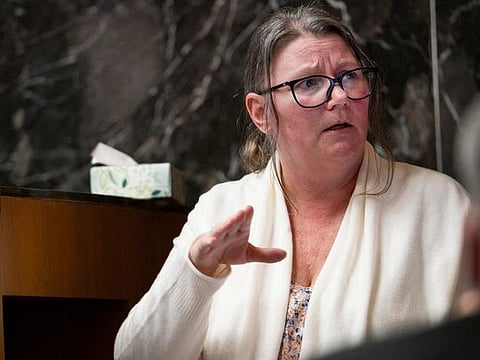 Jennifer Crumbley, the mother of a Michigan boy who shot dead four high-school classmates in 2021, testifies on the stand in an Oakland County courtroom in Pontiac, Michigan, U.S., February 1, 2024. 