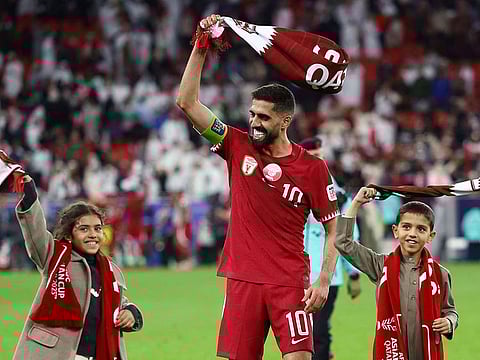 Qatar's Hassan Al Haydos celebrates after reaching the AFC Asian Cup final.