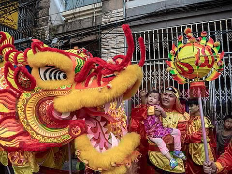 Photos: Asia welcomes Lunar New Year of the Dragon with temple visits and celebrations