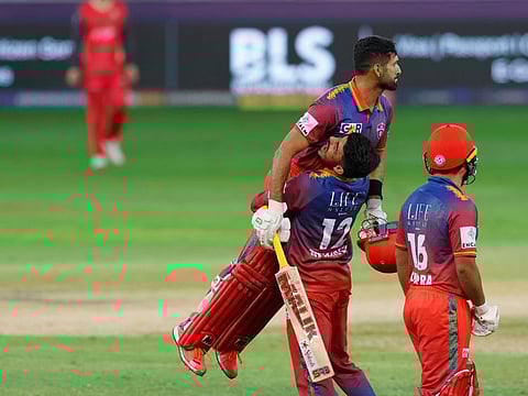 Sikandar Raza of Dubai Capitals celebrates after guiding his team to victory over Desert Vipers in the DP World ILT20 league in Dubai on Friday.