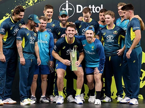 Australia's players pose with the trophy after winning the series following their defeat in the third Twenty20 international against the West Indies at Perth Stadium on Tuesday.