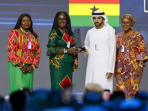 Sheikh Hamdan bin Mohammed bin Rashid Al Maktoum (2nd R), Crown Prince of Dubai and Chairman of the Executive Council, presents the trophy to Ghana Education Outcomes Project, Ministry of Education, Ghana, during the GovTech Prize ceremony at World Governments Summit at Madinat Jumeirah, Dubai on Tuesday
