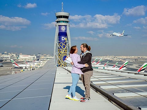 Dmitry and Anastasiia seized the opportunity and emerged as the fortunate couple chosen to take centre stage above DXB's Concourse B.