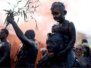 Pancake race, orange fights, ghost-themed polling booth and more: Most offbeat photos of the week