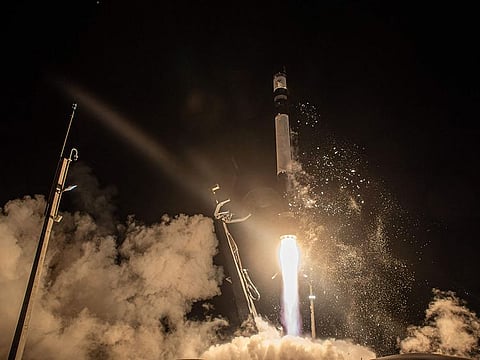 A rocket carrying the Astroscale commercial debris removal demonstration satellite "ADRAS-J" lifting off from Rocket Lab's Launch Complex 1 on New Zealand's Mahia Peninsula. 