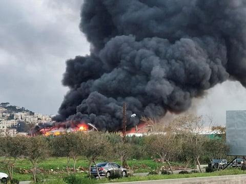 Smoke rises from a site hit by an airstrike after, what Lebanon's state media said, was a series of Israeli strikes, near the town of Ghaziyeh on Lebanon's coast around 60 km north of the border with Israel, on February 19, 2024.  