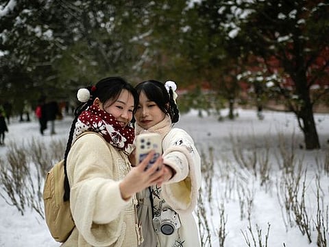 Photos: Heavy snow hits north and central China, disrupting traffic and canceling classes