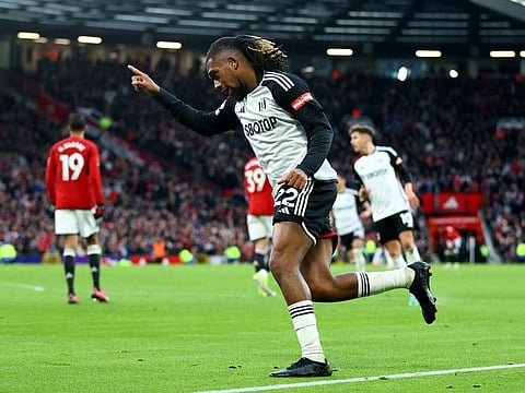 Fulham's Alex Iwobi celebrates scoring their second goal during a Premier League match against Manchester United at Old Trafford, Manchester, on Saturday.