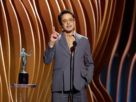 Robert Downey Jr. accepts the Outstanding Performance by a Male Actor in a Supporting Role in a Motion Picture award for “Oppenheimer” onstage during the 30th Annual Screen Actors Guild Awards at Shrine Auditorium and Expo Hall on February 24, 2024 in Los Angeles, California.   