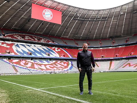 New Sport director Max Eberl poses on the pitch of Bayern Munich's football stadion 'Allianz Arena' after being officialy presented as new sport director of the German first division Bundesliga football club FC Bayern Munich in Munich, southern Germany, on Tuesday.