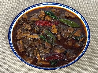 Experience Kerala's culinary delights: Savoury and spicy Mushroom Theeyal recipe