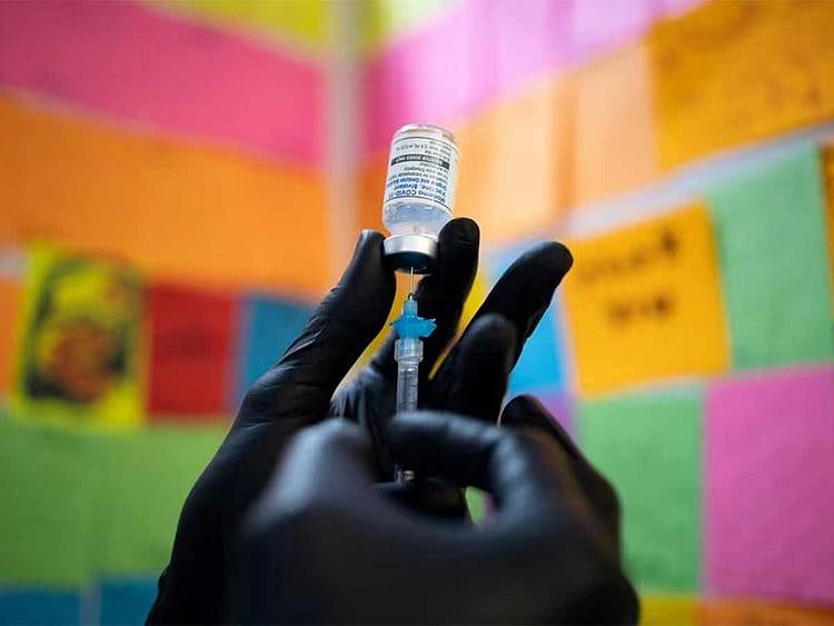 File photo: A doctor draws the Moderna COVID-19 booster vaccine at a pharmacy in Schwenksville, Pennsylvania. 