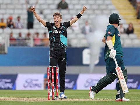 New Zealands Ben Sears celebrates the wicket of Australias Matthew Short during the third Twenty20 cricket match at Eden Park in Auckland on February 25.