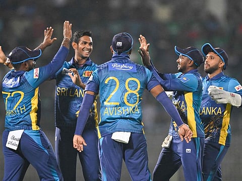 Sri Lanka's players celebrate after the dismissal of Bangladesh's Soumya Sarkar during the first Twenty20 international cricket match between Sri Lanka at the Sylhet International Cricket Stadium in Sylhet on Monday.
