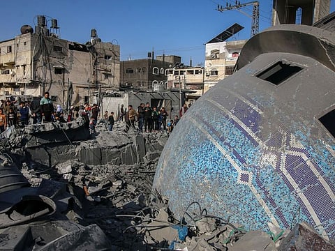 The collapsed dome of a destroyed mosque following an Israeli raid in Deir Al Balah, Gaza.  