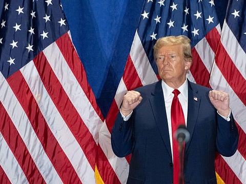 Trump gestures during a "Get Out the Vote" rally at the Greater Richmond Convention Center in Richmond, Virginia, on March 2, 2024.  